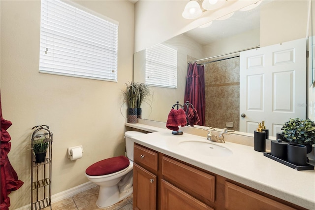 bathroom featuring vanity, toilet, baseboards, a shower with shower curtain, and tile patterned floors
