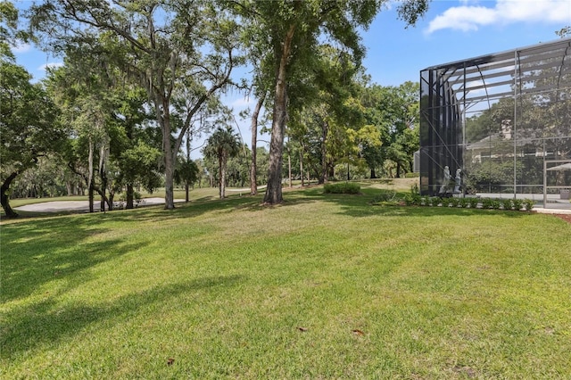 1716 Greystone Ct, Longwood, FL 32779 - view of yard featuring glass enclosure