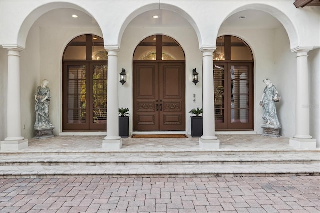 1716 Greystone Ct, Longwood, FL 32779 - entrance to property featuring stucco siding and french doors
