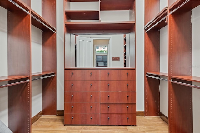1716 Greystone Ct, Longwood, FL 32779 - spacious closet featuring wood finished floors