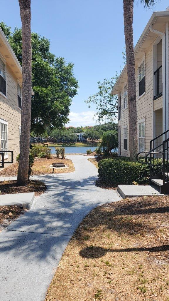 1071 S Hiawassee Rd Unit 1211, Orlando, FL 32835 - view of property's community with a water view