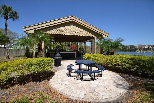 1071 S Hiawassee Rd Unit 1211, Orlando, FL 32835 - view of patio with a hot tub and a gazebo