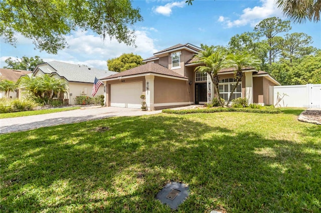 traditional-style house featuring a front yard, dirt driveway, a garage, fence, and stucco siding