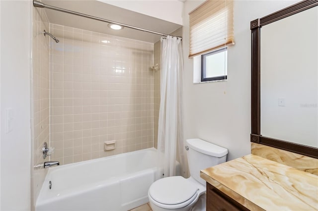 full bath featuring vanity, toilet, and shower / tub combo