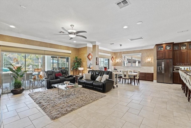 11502 Waterstone Loop Dr, Windermere, FL 34786 - living area featuring ceiling fan, a textured ceiling, and recessed lighting