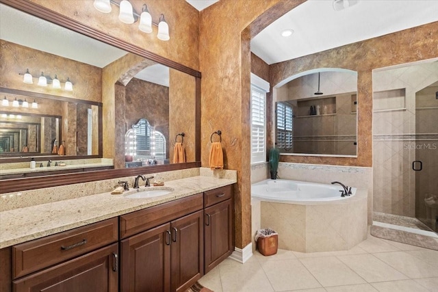 11502 Waterstone Loop Dr, Windermere, FL 34786 - full bathroom featuring a stall shower, a bath, vanity, and tile patterned floors