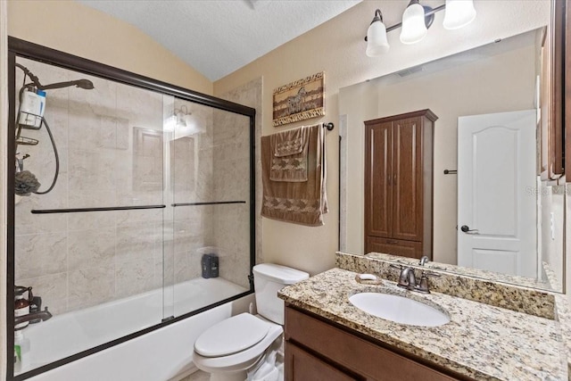 11502 Waterstone Loop Dr, Windermere, FL 34786 - full bathroom featuring vanity, enclosed tub / shower combo, toilet, lofted ceiling, and a textured ceiling