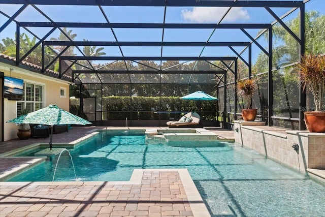 11502 Waterstone Loop Dr, Windermere, FL 34786 - view of swimming pool featuring a pool with connected hot tub, glass enclosure, and a patio