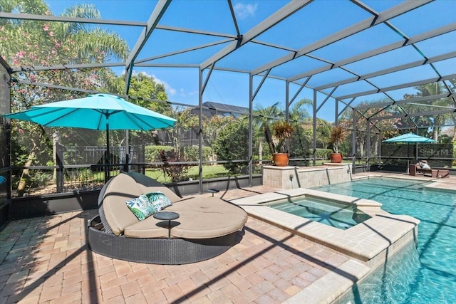11502 Waterstone Loop Dr, Windermere, FL 34786 - view of pool featuring glass enclosure, a patio, and a pool with connected hot tub
