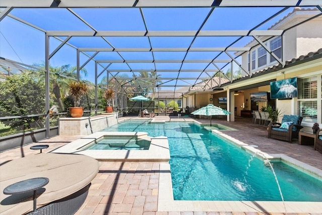 11502 Waterstone Loop Dr, Windermere, FL 34786 - view of pool with a patio, glass enclosure, and a pool with connected hot tub