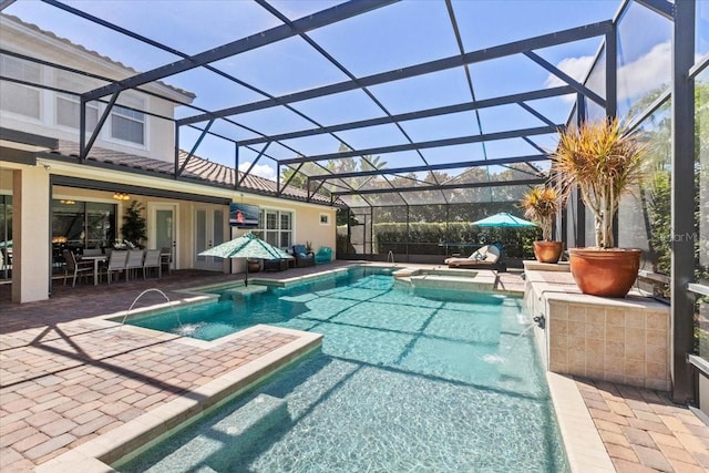11502 Waterstone Loop Dr, Windermere, FL 34786 - view of swimming pool featuring a patio, a pool with connected hot tub, a lanai, and outdoor dining space