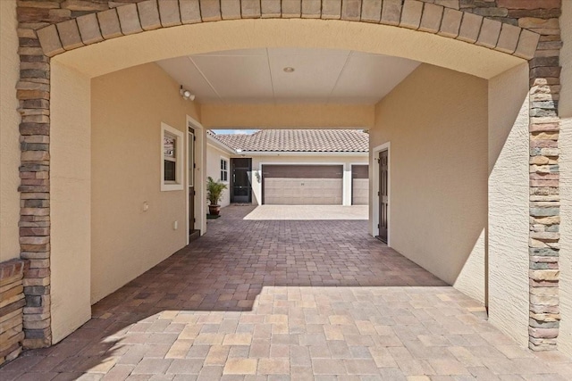 11502 Waterstone Loop Dr, Windermere, FL 34786 - view of patio featuring decorative driveway