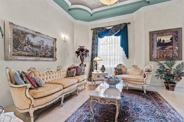 living area featuring crown molding, baseboards, and tile patterned flooring