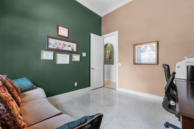 interior space featuring baseboards, ornamental molding, a towering ceiling, and marble finish floor