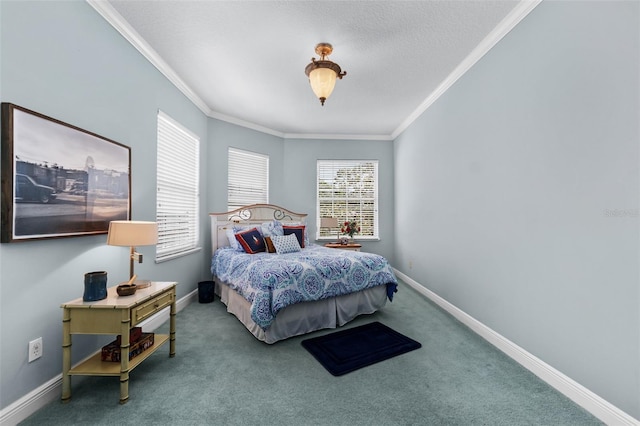 bedroom featuring crown molding, baseboards, and carpet