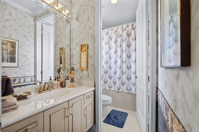 full bath featuring crown molding, vanity, toilet, and wallpapered walls