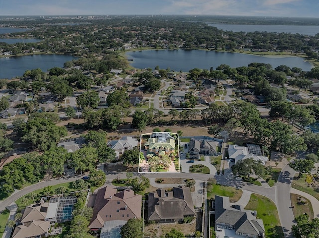 aerial view with a water view and a residential view