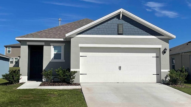 view of front facade featuring stucco siding, roof with shingles, concrete driveway, and an attached garage