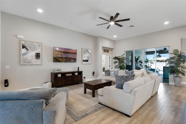 3332 Lone Cypress Pt, Oviedo, FL 32765 - living room featuring a ceiling fan, light wood-style floors, recessed lighting, and baseboards
