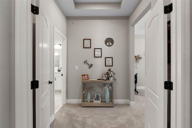 3332 Lone Cypress Pt, Oviedo, FL 32765 - hall featuring carpet floors, baseboards, and a sink