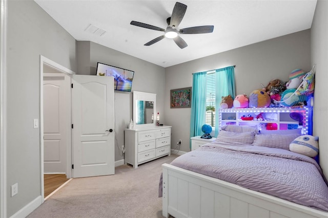 3332 Lone Cypress Pt, Oviedo, FL 32765 - bedroom with light colored carpet, baseboards, and ceiling fan