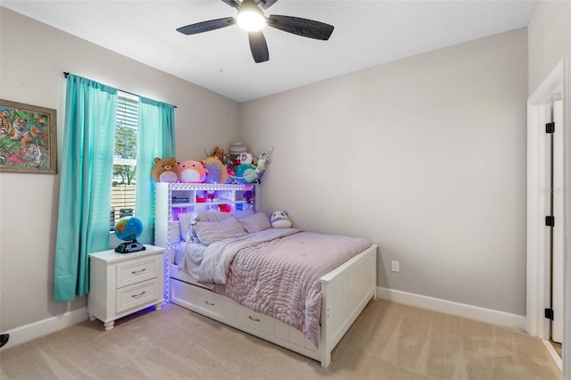 3332 Lone Cypress Pt, Oviedo, FL 32765 - bedroom with light colored carpet, baseboards, and ceiling fan