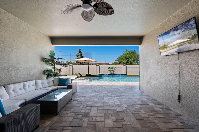 3332 Lone Cypress Pt, Oviedo, FL 32765 - fenced backyard with a ceiling fan, a patio, and an outdoor living space