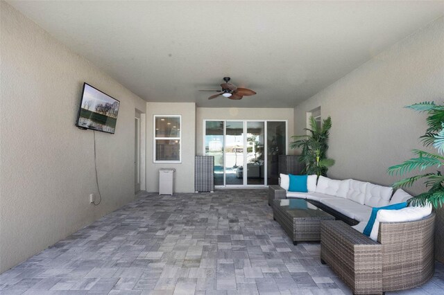 3332 Lone Cypress Pt, Oviedo, FL 32765 - view of patio / terrace with a ceiling fan and an outdoor living space