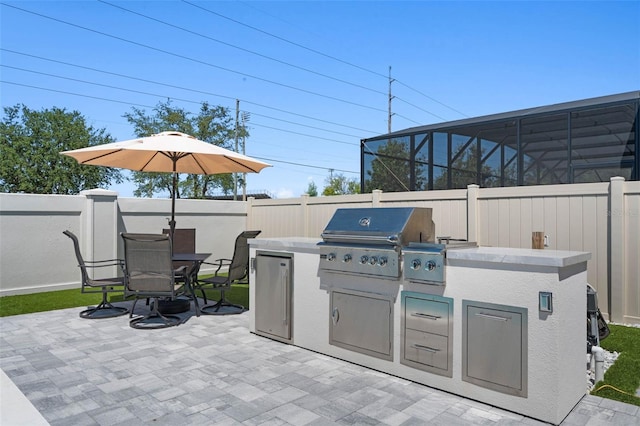 3332 Lone Cypress Pt, Oviedo, FL 32765 - fenced backyard with a patio area and outdoor dining space