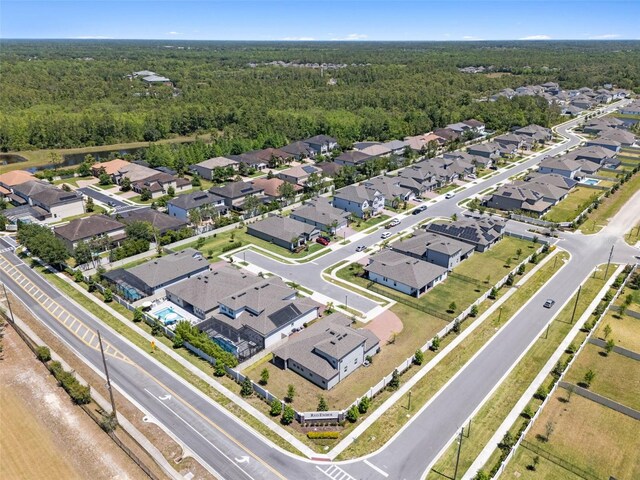 3332 Lone Cypress Pt, Oviedo, FL 32765 - aerial perspective of suburban area featuring a forest