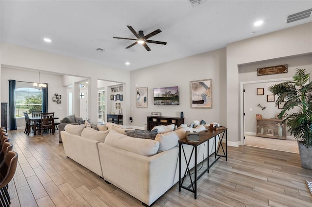 3332 Lone Cypress Pt, Oviedo, FL 32765 - living room with light wood-type flooring, a ceiling fan, recessed lighting, and baseboards