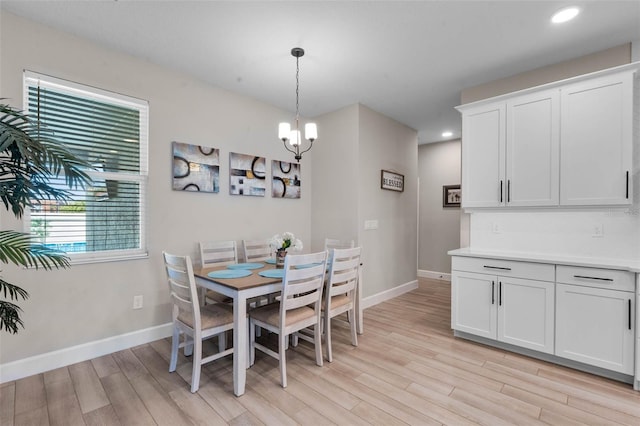 3332 Lone Cypress Pt, Oviedo, FL 32765 - dining area featuring light wood-style flooring, a chandelier, baseboards, and recessed lighting