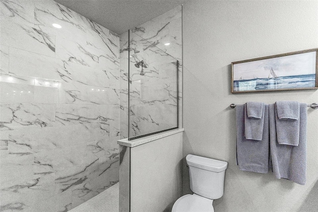 3078 Isles Way, New Smyrna Beach, FL 32168 - full bathroom with a marble finish shower and toilet