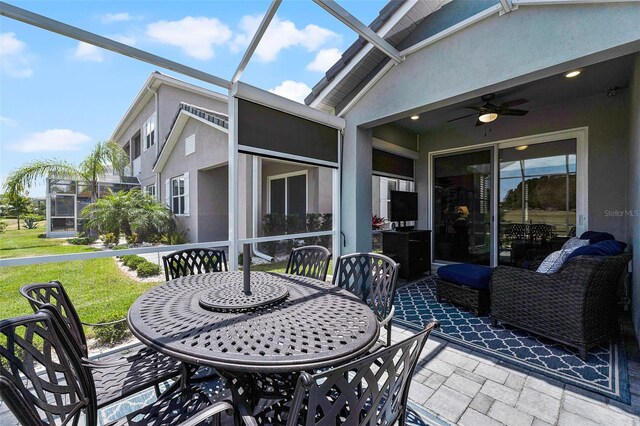 3078 Isles Way, New Smyrna Beach, FL 32168 - view of patio / terrace featuring ceiling fan, outdoor dining area, and a lanai