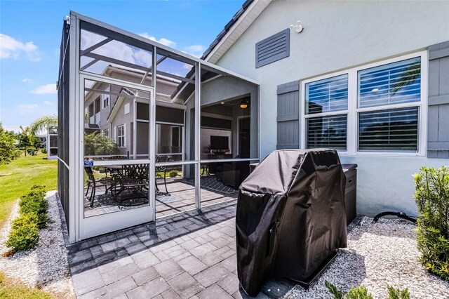 3078 Isles Way, New Smyrna Beach, FL 32168 - view of patio / terrace with a lanai and grilling area