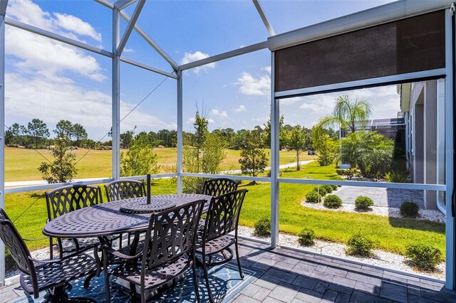 3078 Isles Way, New Smyrna Beach, FL 32168 - sunroom / solarium featuring outdoor dining area