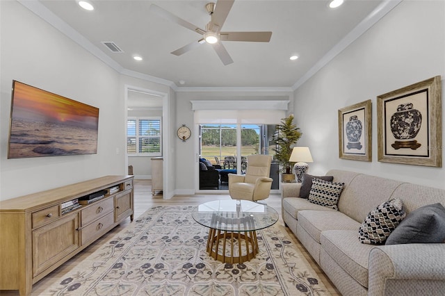 3078 Isles Way, New Smyrna Beach, FL 32168 - living room with a ceiling fan, recessed lighting, ornamental molding, light wood-style floors, and baseboards