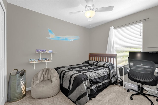 bedroom featuring carpet floors and a ceiling fan