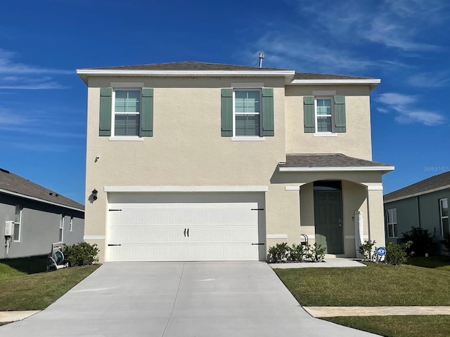 8375 Madrid St, Lakeland, FL 33810 - traditional-style home with a front yard, stucco siding, driveway, and an attached garage