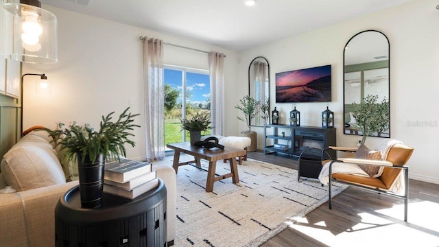 8375 Madrid St, Lakeland, FL 33810 - living area with baseboards, recessed lighting, and light wood-style floors