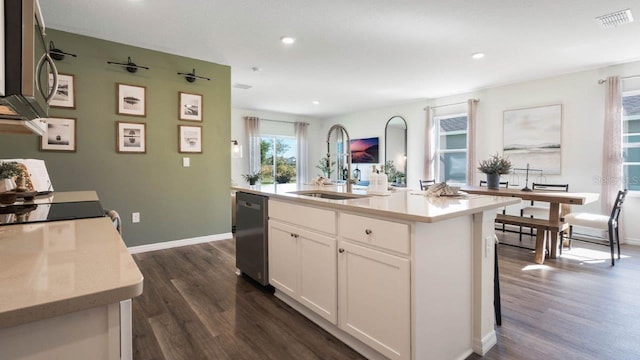 8375 Madrid St, Lakeland, FL 33810 - kitchen with appliances with stainless steel finishes, light countertops, dark wood finished floors, and a sink