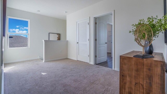 8375 Madrid St, Lakeland, FL 33810 - carpeted bedroom featuring baseboards