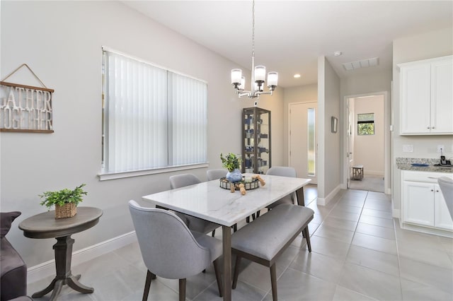 2423 Datura Loop, Saint Cloud, FL 34772 - dining room featuring a chandelier, recessed lighting, baseboards, and light tile patterned flooring