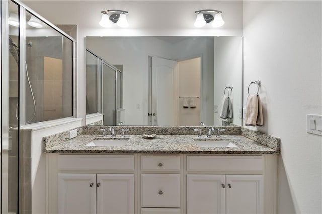 2423 Datura Loop, Saint Cloud, FL 34772 - full bathroom featuring double vanity and a stall shower