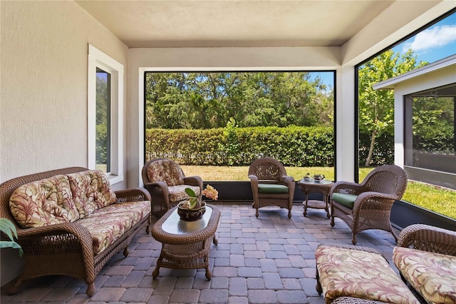 2423 Datura Loop, Saint Cloud, FL 34772 - sunroom / solarium featuring an outdoor living space and plenty of natural light