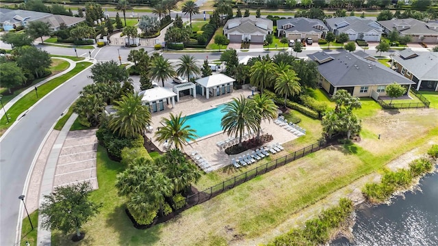 2423 Datura Loop, Saint Cloud, FL 34772 - aerial perspective of suburban area featuring a pool area and a large body of water