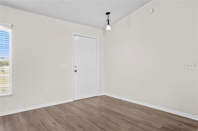 15 Sawfish Ln, Kissimmee, FL 34759 - empty room with baseboards and wood finished floors