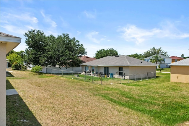 15 Sawfish Ln, Kissimmee, FL 34759 - view of yard featuring fence
