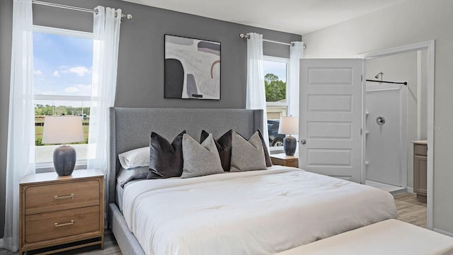 bedroom with wood finished floors