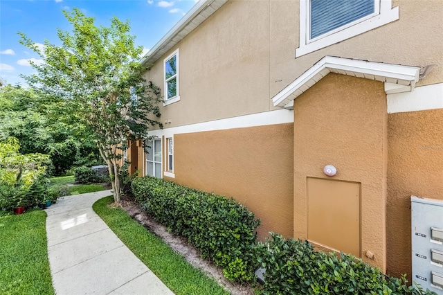 1821 San Jacinto Cir, Sanford, FL 32771 - view of side of property featuring stucco siding